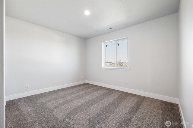 4247 W Sandy Ct, Moses Lake, WA 98837 - spare room with carpet floors, baseboards, and recessed lighting