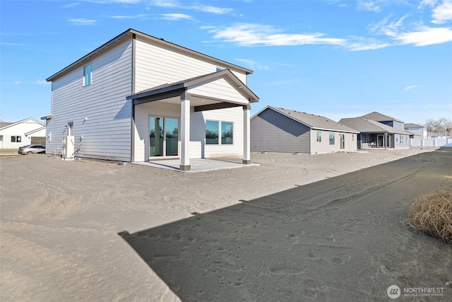 4247 W Sandy Ct, Moses Lake, WA 98837 - back of property featuring a residential view and a patio area