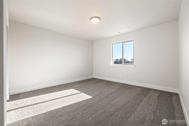 4235 W Sandy Ct, Moses Lake, WA 98837 - unfurnished room with carpet floors and baseboards