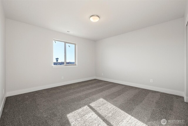 4235 W Sandy Ct, Moses Lake, WA 98837 - empty room featuring carpet flooring and baseboards