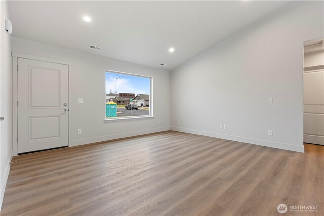 202 N Sandy Loop, Moses Lake, WA 98837 - empty room featuring light wood finished floors, baseboards, and recessed lighting