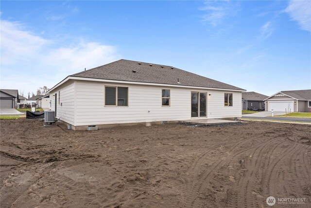 202 N Sandy Loop, Moses Lake, WA 98837 - back of house with central AC unit, a shingled roof, a residential view, and a patio area