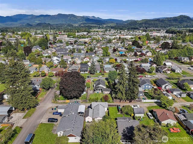 1165 Harding St, Enumclaw, WA 98022 - aerial view of property and surrounding area with nearby suburban area and a mountain backdrop