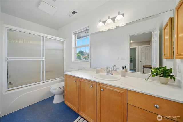 1210 Southview Dr, Walla Walla, WA 99362 - bathroom with vanity, toilet, and combined bath / shower with glass door