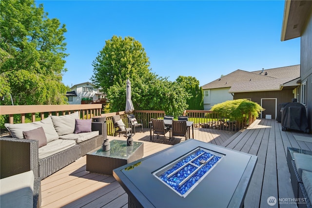 1210 Southview Dr, Walla Walla, WA 99362 - wooden terrace featuring an outdoor living space with a fire pit, area for grilling, and outdoor dining area