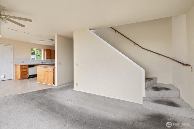 300 N St, Sequim, WA 98382 - unfurnished living room with stairs and a ceiling fan