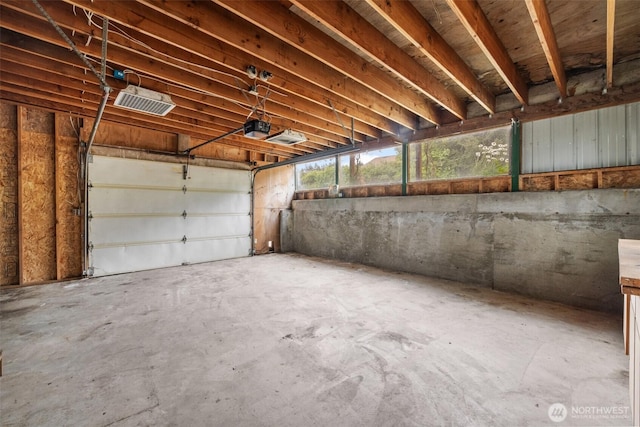 300 N St, Sequim, WA 98382 - garage featuring a garage door opener