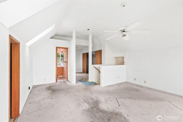 300 N St, Sequim, WA 98382 - unfurnished living room with lofted ceiling, light carpet, and ceiling fan
