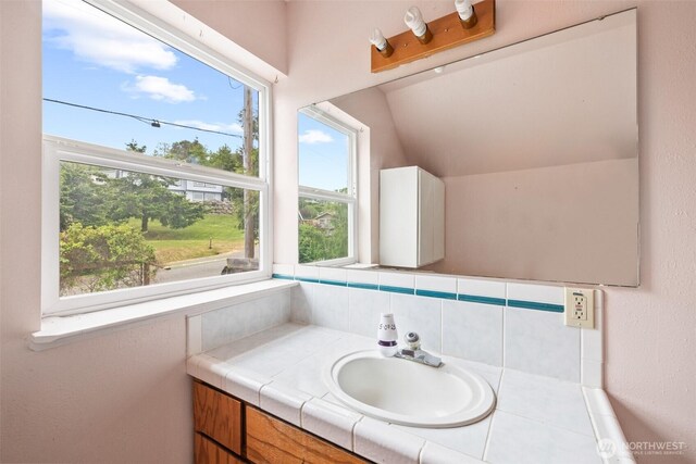 300 N St, Sequim, WA 98382 - bathroom featuring vanity and lofted ceiling