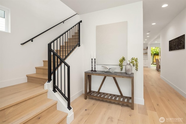 10304 NE 113th Pl, Kirkland, WA 98033 - stairway featuring baseboards, recessed lighting, and wood finished floors
