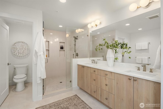 10304 NE 113th Pl, Kirkland, WA 98033 - bathroom with double vanity, a stall shower, toilet, and recessed lighting