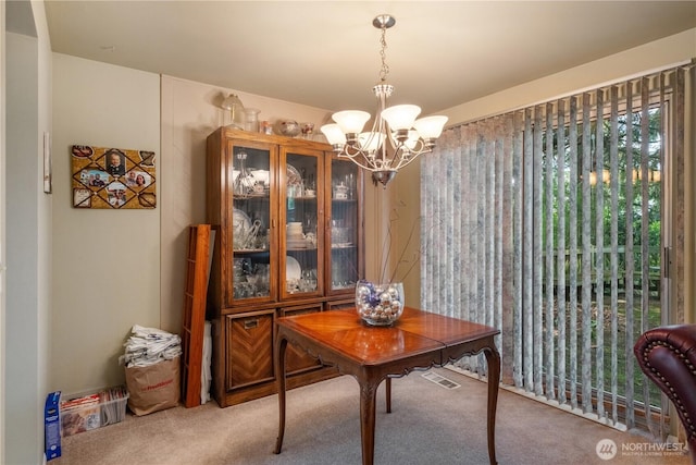 14904 108th Pl NE, Bothell, WA 98011 - dining room with carpet floors and a chandelier