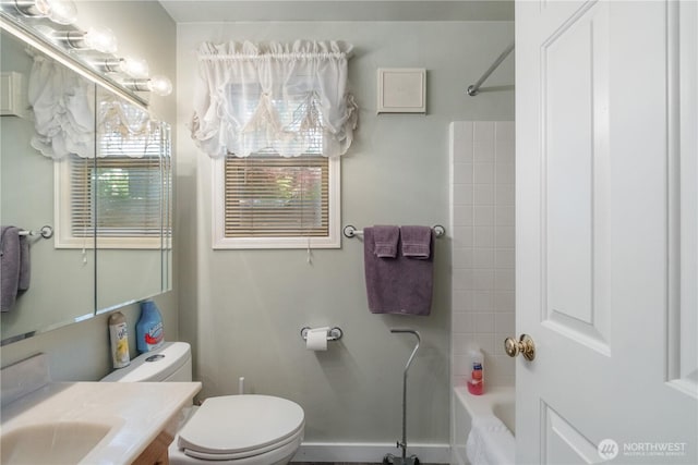 14904 108th Pl NE, Bothell, WA 98011 - bathroom with vanity, toilet, and washtub / shower combination