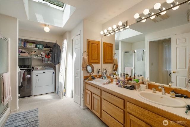 14904 108th Pl NE, Bothell, WA 98011 - bathroom featuring separate washer and dryer, a stall shower, double vanity, a skylight, and a closet