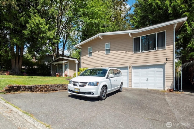 14904 108th Pl NE, Bothell, WA 98011 - view of front facade featuring asphalt driveway, a garage, and a front lawn