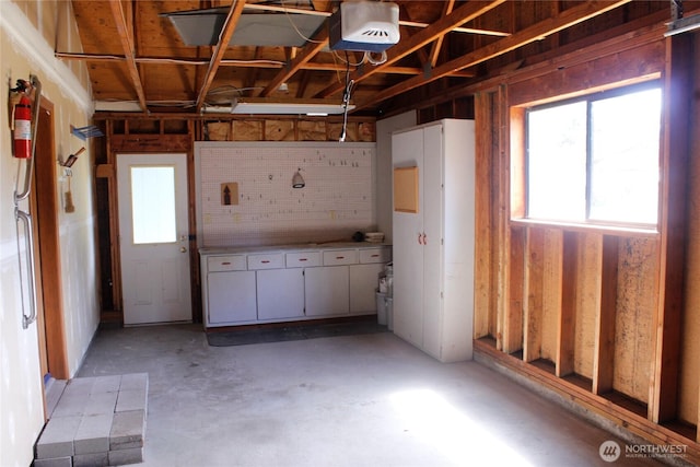 19494 N N Pl, Long Beach, WA 98631 - garage featuring a garage door opener