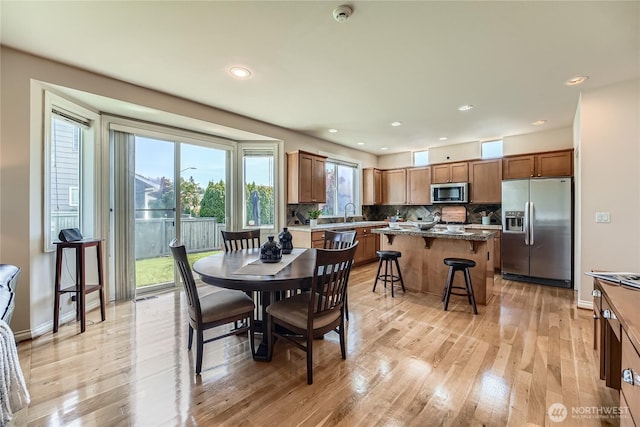 270 Kitsap Ave NE, Renton, WA 98059 - dining room featuring light wood-style floors, recessed lighting, and baseboards