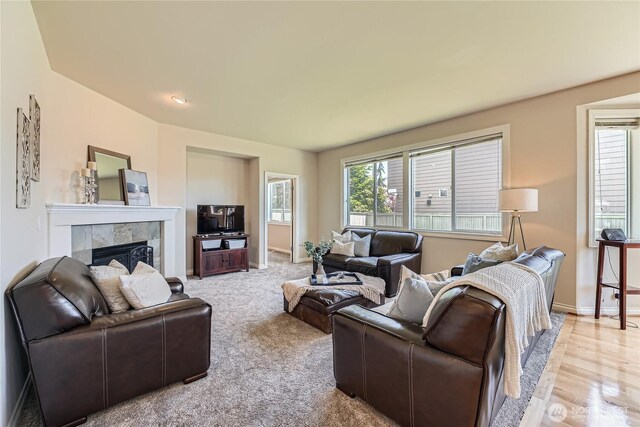270 Kitsap Ave NE, Renton, WA 98059 - living room featuring a fireplace and baseboards