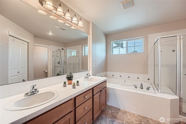 270 Kitsap Ave NE, Renton, WA 98059 - bathroom featuring a shower stall, a bath, and double vanity