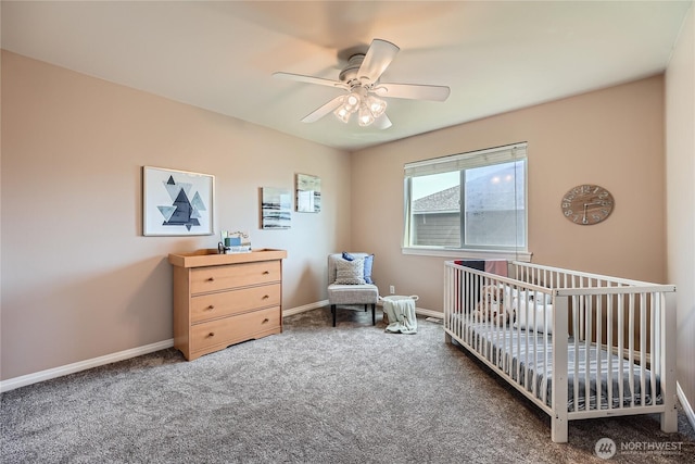270 Kitsap Ave NE, Renton, WA 98059 - bedroom featuring carpet flooring, a nursery area, baseboards, and ceiling fan