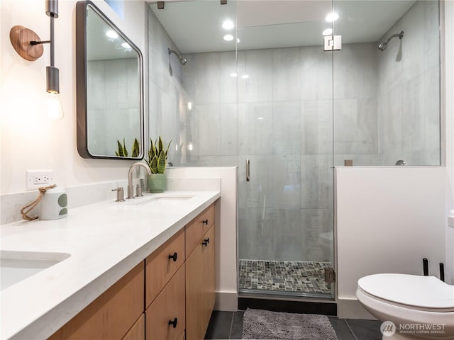 7400 Miller Way, Glacier, WA 98244 - full bathroom with double vanity, a shower stall, toilet, tile patterned flooring, and recessed lighting