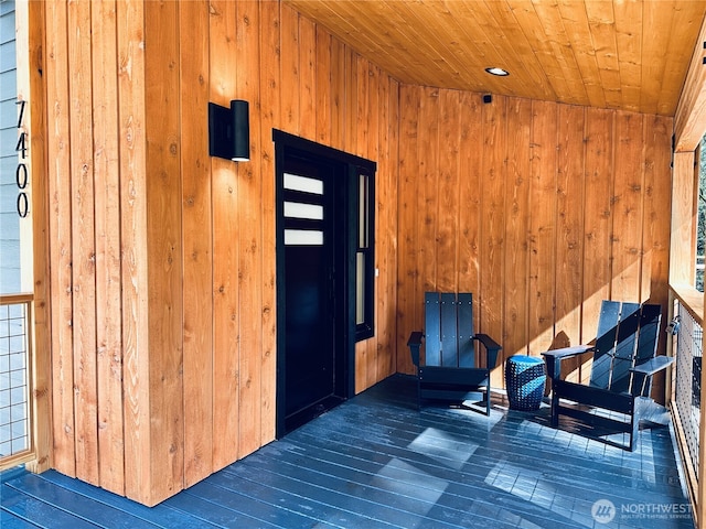 7400 Miller Way, Glacier, WA 98244 - unfurnished room featuring wood walls, wooden ceiling, and hardwood / wood-style floors
