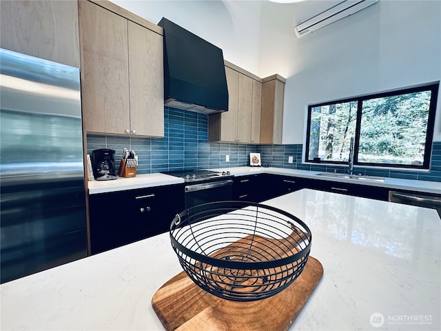 7400 Miller Way, Glacier, WA 98244 - kitchen with stainless steel appliances, wall chimney range hood, a wall mounted air conditioner, and tasteful backsplash