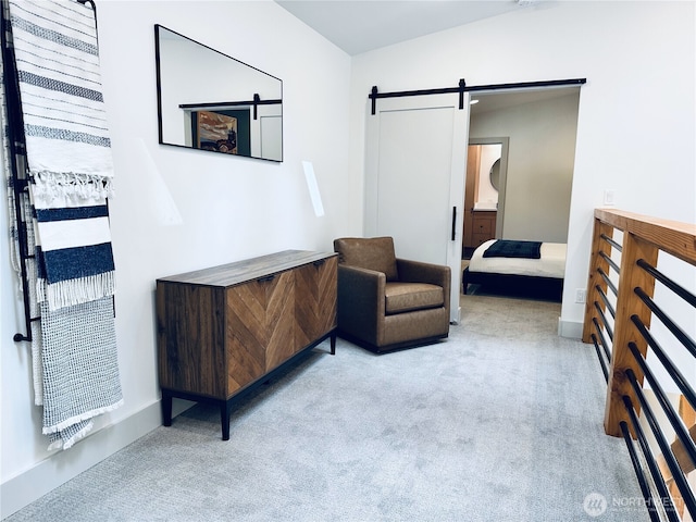 7400 Miller Way, Glacier, WA 98244 - living area featuring a barn door, carpet, and baseboards