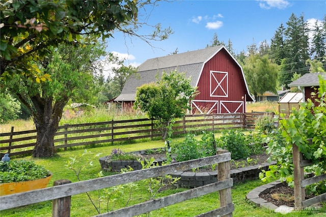 12012 County Line Rd E, Edgewood, WA 98372 - view of barn featuring a vegetable garden