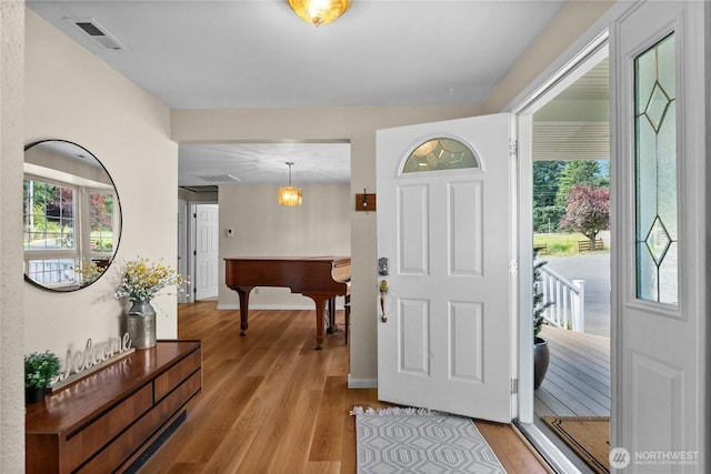 12012 County Line Rd E, Edgewood, WA 98372 - foyer entrance with light wood-type flooring and billiards