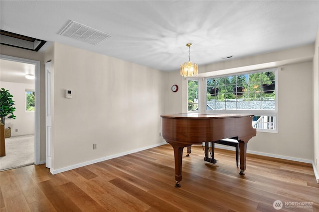 12012 County Line Rd E, Edgewood, WA 98372 - sitting room featuring wood finished floors and baseboards