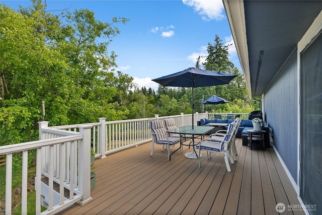 12012 County Line Rd E, Edgewood, WA 98372 - deck featuring an outdoor hangout area and outdoor dining space