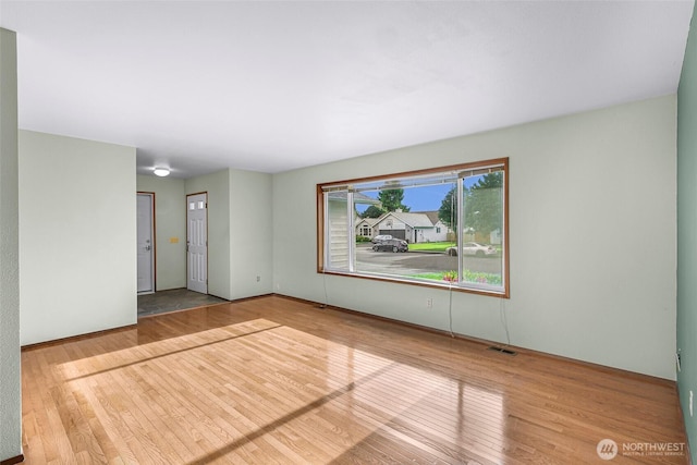 873 Fern Dr, Lynden, WA 98264 - spare room featuring hardwood / wood-style flooring and baseboards
