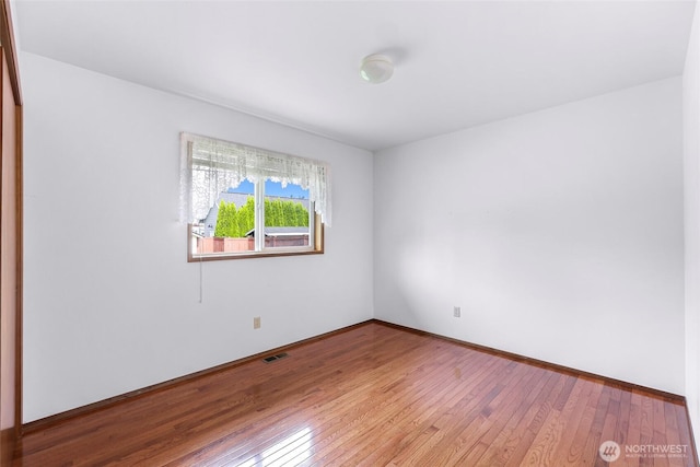 873 Fern Dr, Lynden, WA 98264 - unfurnished room featuring hardwood / wood-style floors and baseboards