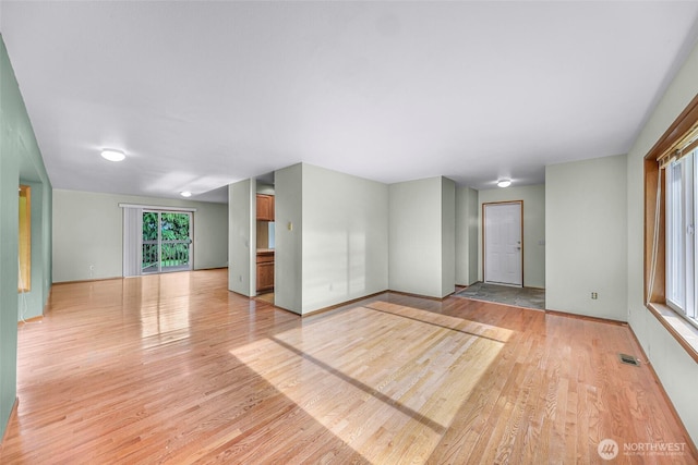 873 Fern Dr, Lynden, WA 98264 - spare room featuring light wood-style flooring and baseboards
