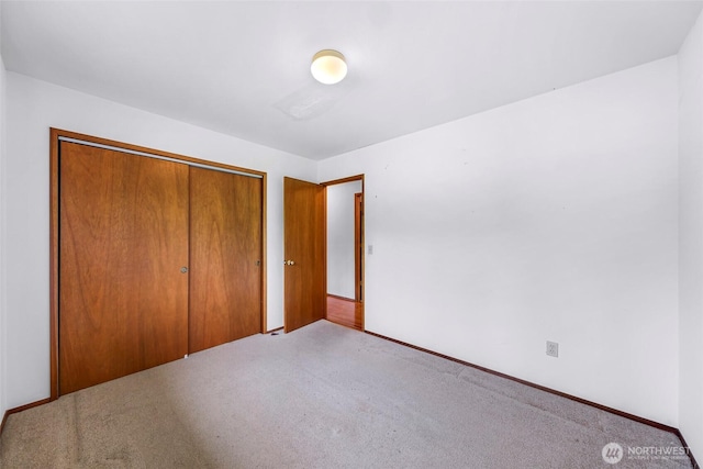 873 Fern Dr, Lynden, WA 98264 - unfurnished bedroom with carpet floors, a closet, and baseboards