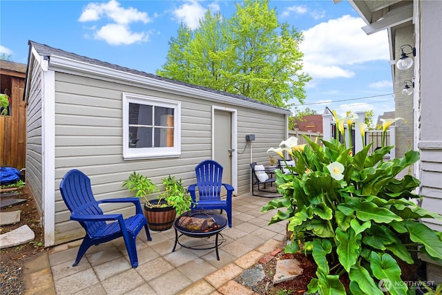 707 N Adams St, Tacoma, WA 98406 - view of patio with an outdoor fire pit