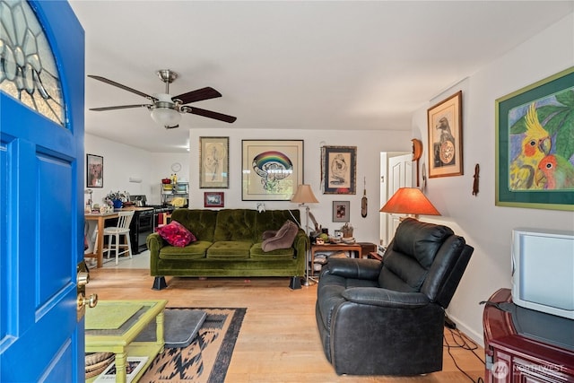 973 US Highway 101, Cosmopolis, WA 98537 - living area featuring wood finished floors and a ceiling fan