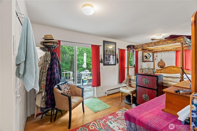 973 US Highway 101, Cosmopolis, WA 98537 - sitting room with wood finished floors and baseboard heating