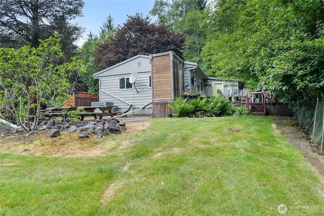 973 US Highway 101, Cosmopolis, WA 98537 - view of yard featuring a deck