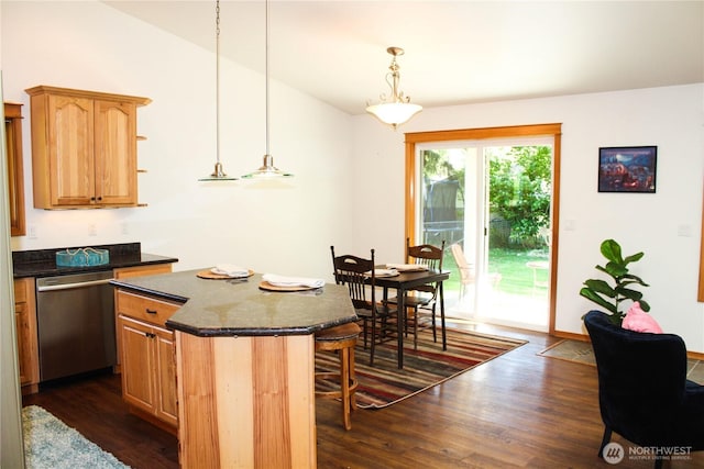 17247 154th Ave SE, Yelm, WA 98597 - kitchen featuring stainless steel dishwasher, dark wood-style flooring, a center island, and a kitchen bar