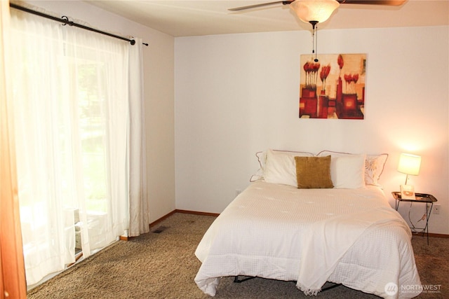 17247 154th Ave SE, Yelm, WA 98597 - carpeted bedroom with baseboards and a ceiling fan