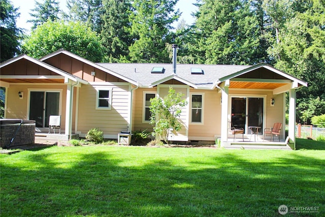 17247 154th Ave SE, Yelm, WA 98597 - rear view of property with a yard, board and batten siding, a shingled roof, a patio area, and crawl space