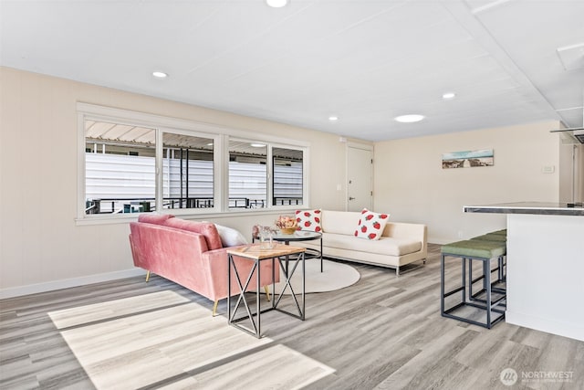 12615 113th St E Unit 249, Puyallup, WA 98374 - living area featuring light wood-style floors, baseboards, and recessed lighting