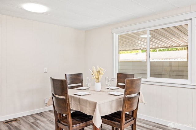 12615 113th St E Unit 249, Puyallup, WA 98374 - dining space with light wood-style flooring and baseboards