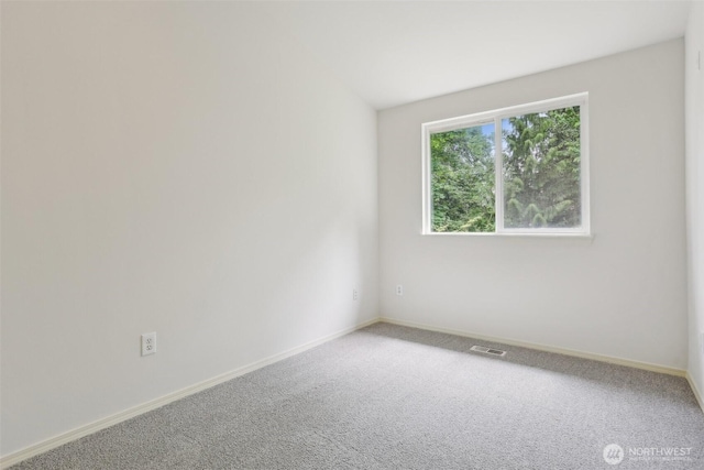 21616 9th Ave SE Unit C-105, Bothell, WA 98021 - empty room featuring carpet and baseboards