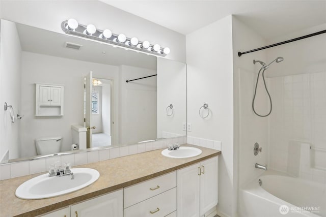 21616 9th Ave SE Unit C-105, Bothell, WA 98021 - bathroom with toilet,  shower combination, and double vanity