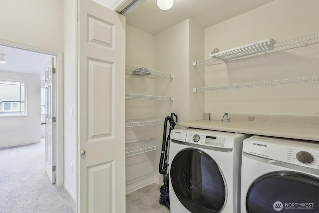 21616 9th Ave SE Unit C-105, Bothell, WA 98021 - laundry area with independent washer and dryer and light colored carpet