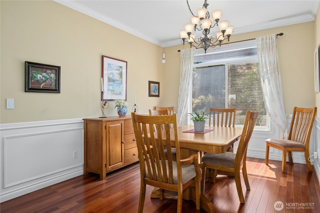 12232 SE 80th Way, Newcastle, WA 98056 - dining area featuring a chandelier, ornamental molding, dark wood-style floors, and wainscoting
