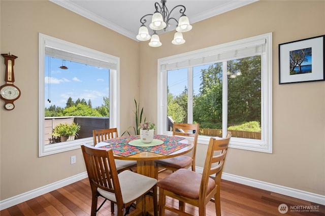 12232 SE 80th Way, Newcastle, WA 98056 - dining room featuring wood finished floors, baseboards, crown molding, and a chandelier